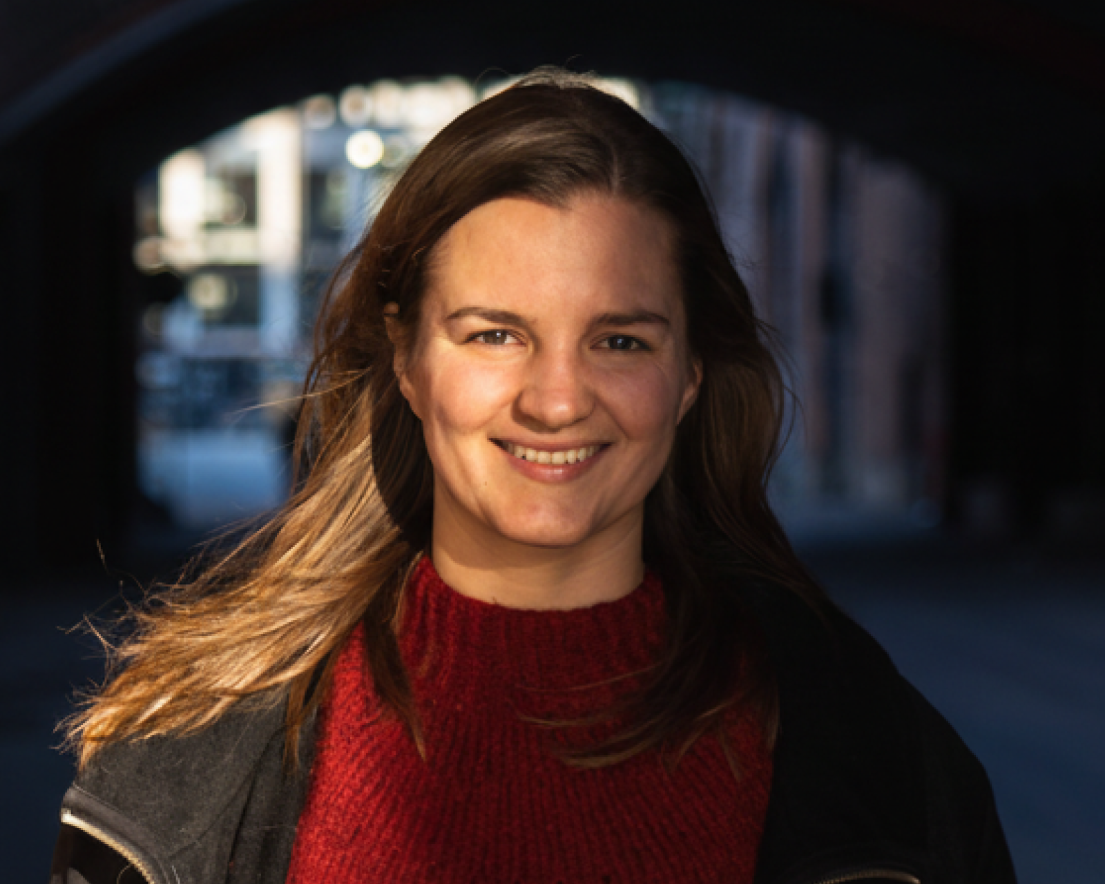 anne clara laugesen in front of a pedestrian tunnel